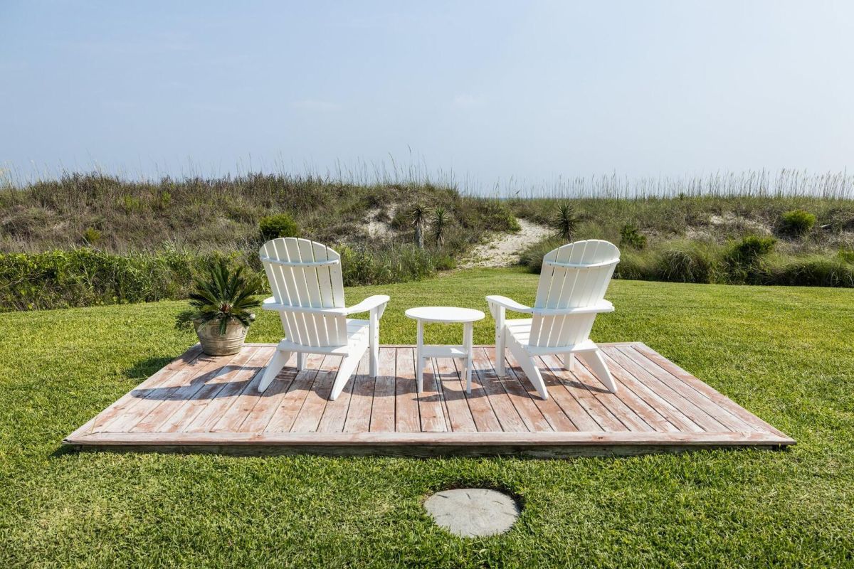 two beach chairs outside facing out